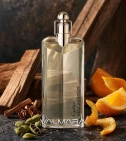 Imagen ambientada del perfume Declaration De Cartier 100 ML Hombre EDT con notas de Cedro, Cardamomo, Naranja Amarga, Alcaravea. - VALMARA