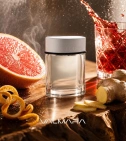 Imagen ambientada del perfume Tous Man 100 ML Hombre EDT con notas de Toronja, Campari, Jengibre, Sándalo. - VALMARA