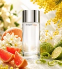 Imagen ambientada del perfume Clinique Happy De Clinique 100 ML Mujer EDP con notas de Toronja Sanguina, Flor De Boda Hawaian... - VALMARA