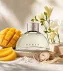 Imagen ambientada del perfume Boss Woman De Hugo Boss 90 ML Mujer EDP con notas de Mango, Fresia, Raíz De Violeta, Cedro Blanco. - VALMARA